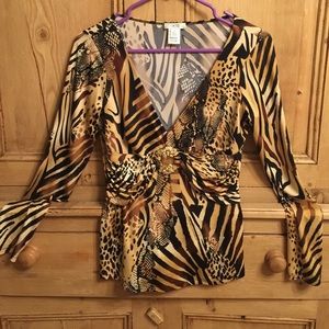 Pretty animal print blouse with ornate center Med