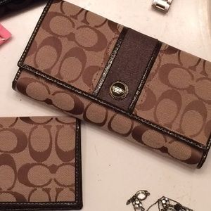 Brown Coach wallet and checkbook