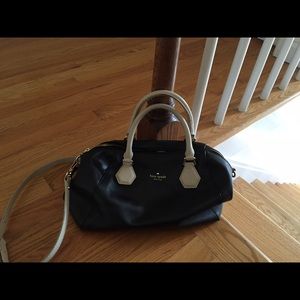 Black and cream Kate Spade pocketbook.