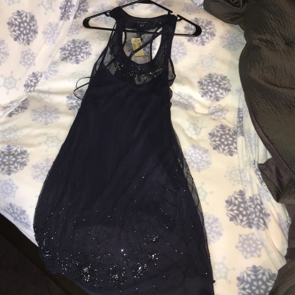 Beautifully beaded dress. Never worn. NWT