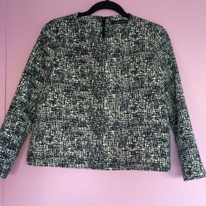 Black and white patterned top.