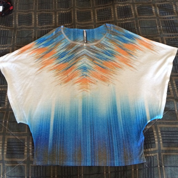 Petrol Tops - January only. Petrol jeweled batwing top