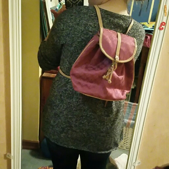 Pink purse backpack