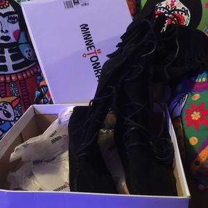 Minnetonka front lace knee-boots .