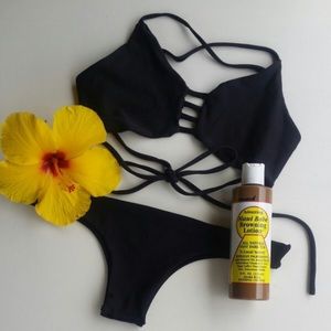 Black strappy swimsuit.