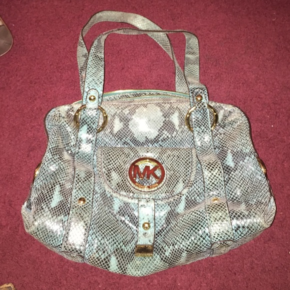 Michael Kors turquoise snackskin. Gold.