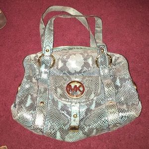Michael Kors turquoise snackskin. Gold.