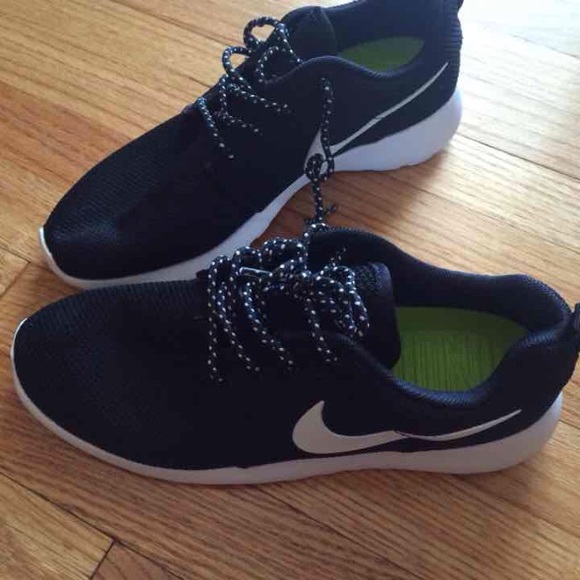 Black Nike Roshe with white swoosh
