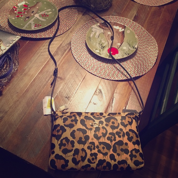 Coach cross body cheetah print purse