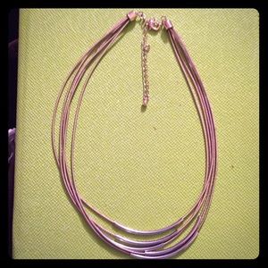 A two toned, multi strand necklace