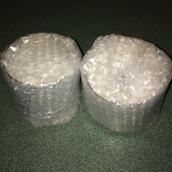 2 winter white petals candles.