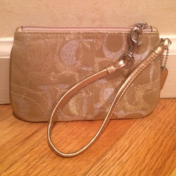 Coach Handbags - Gold Coach Signature Wristlet