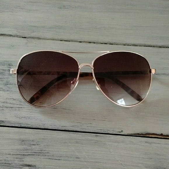 Gold framed aviator style sunglasses