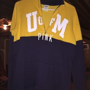 A blue and yellow Michigan sweater