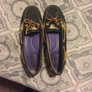 Black and gold Sperry's