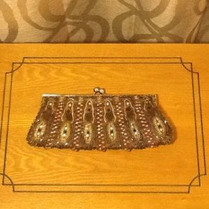 Satin beaded kiss lock clutch