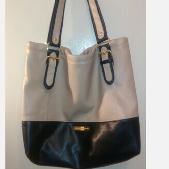 A nice tan and black purse