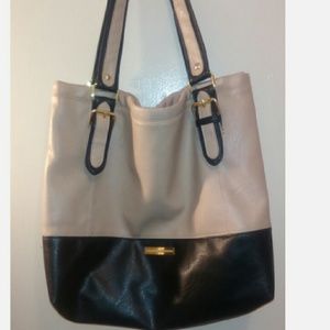 A nice tan and black purse