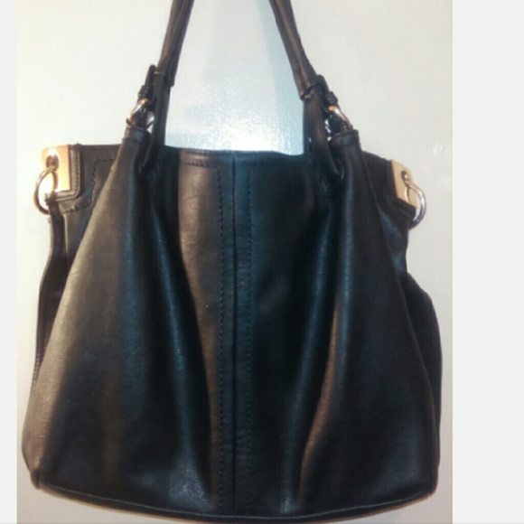 A very nice black and gold purse