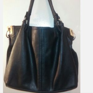 A very nice black and gold purse