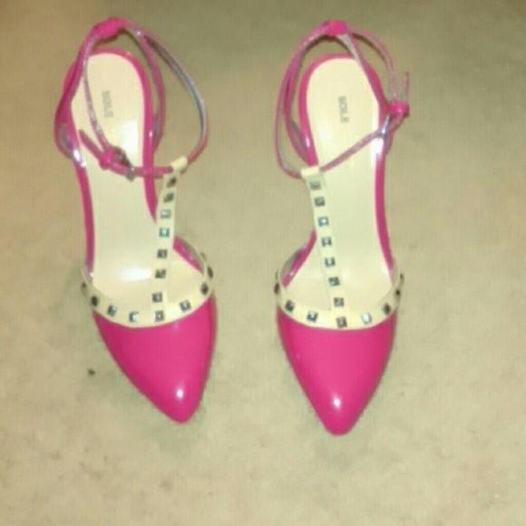 Fuchsia patent leather heels.