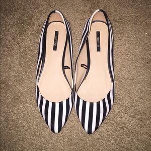 Black and white striped flats