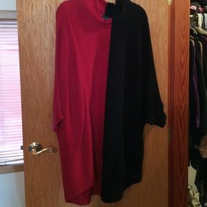 Poncho style sweater with bat wings.