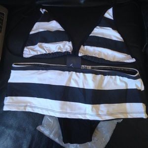 Junior girl swimming suit black and white skirt