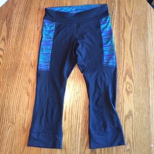 Champion athletic capris, black with blue detail.