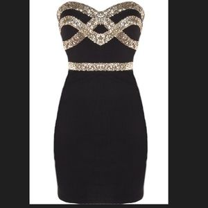 Black and gold fitted strapless dress