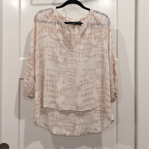 Cream blouse.