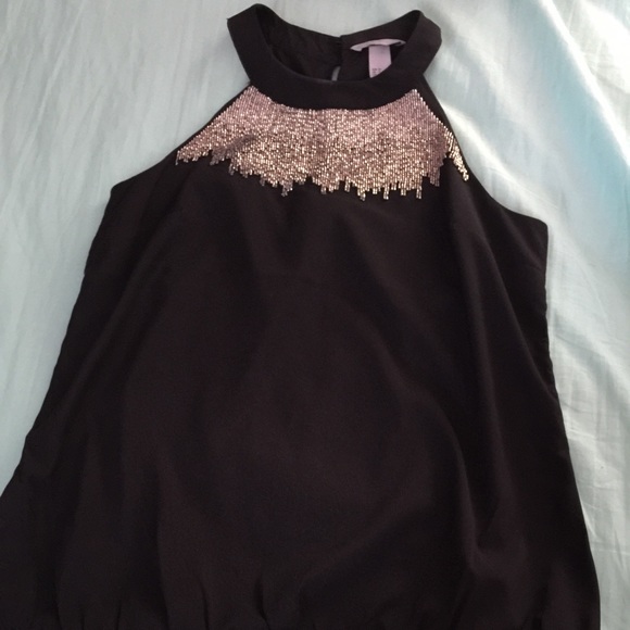 Black with beaded neck line top.