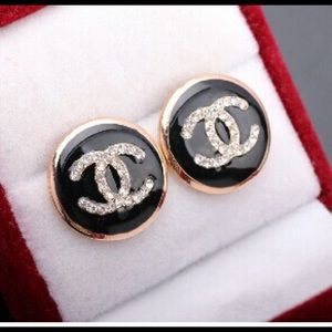 Black and gold round earrings.