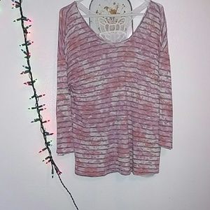 Pink open back mesh blouse.