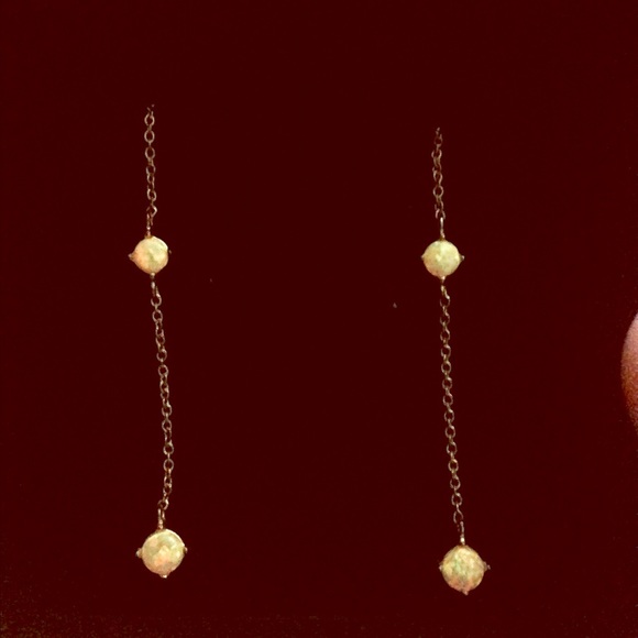 Gold Opal earrings.