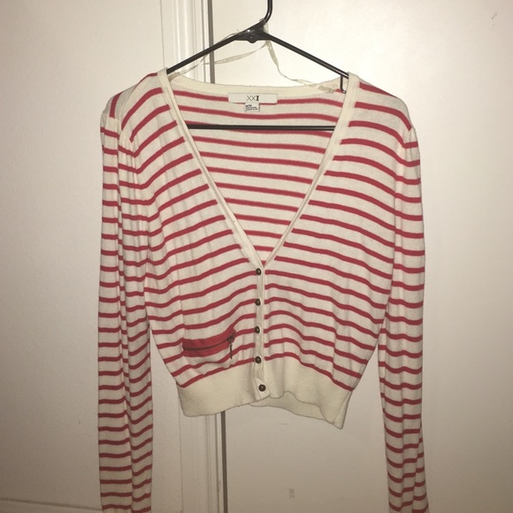 A red and off white sweater