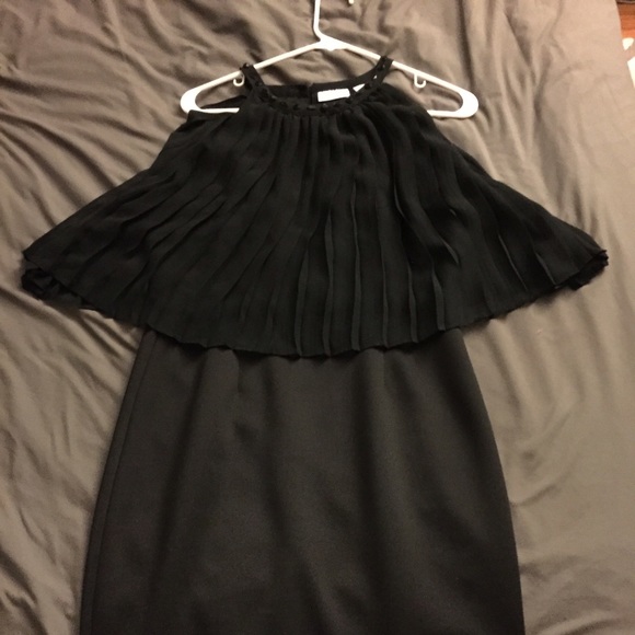 A black dress with a tiered top.