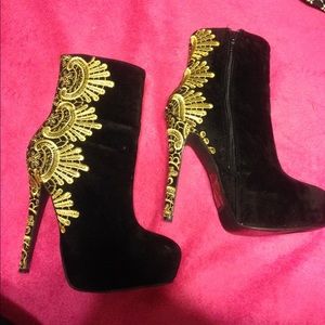 Gold and black heeled booties
