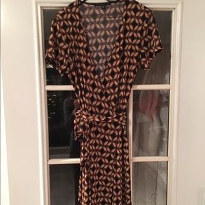 Nice knit wrap-around dress by Tiana B.