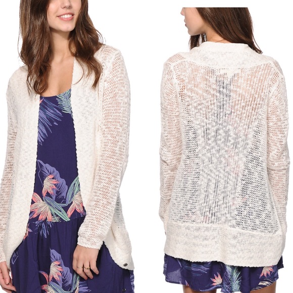 Cream Roxy sweater with knit looking material,sm/p