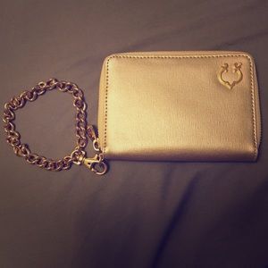 C. Wonder wristlet w/ cell holder (iphone 4 and 5)