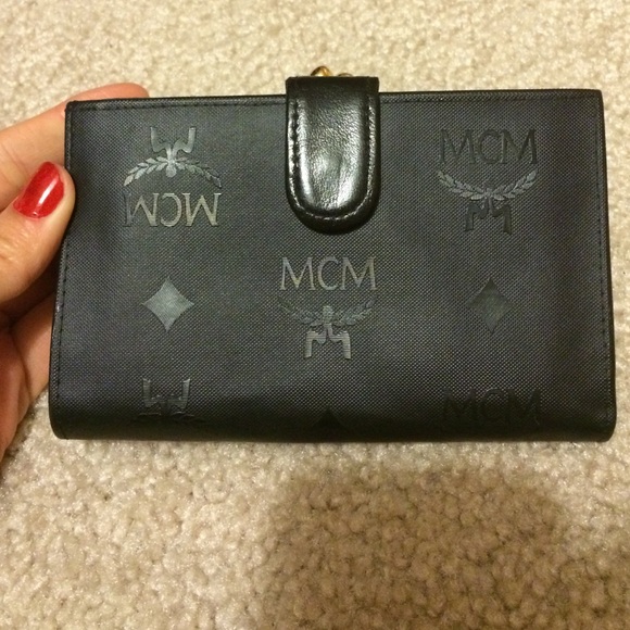 MCM Handbags - Authentic MCM Black and gold wallet