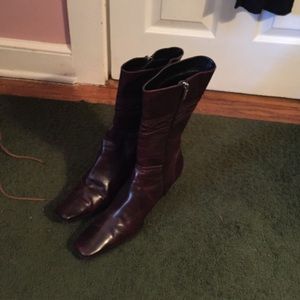 Below the knee dark brown boots