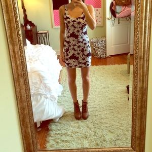 Black bodycon dress with white flowers