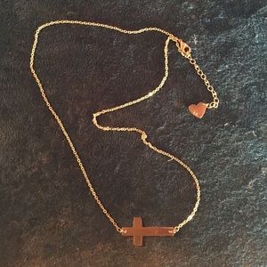 Gold sideways cross necklace