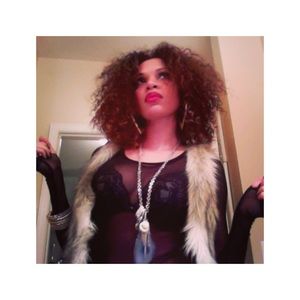 Waist length faux fur vest