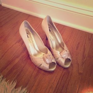 Nude heels with a flower decal