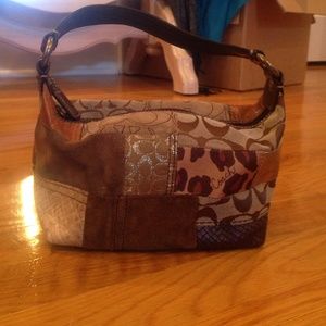Authentic small brown mixed pattern coach hand bag