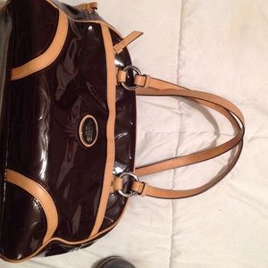 Patent leather Coach Monogram tote.