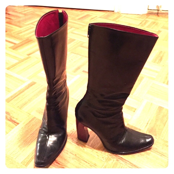 Black patent leather high heal boots